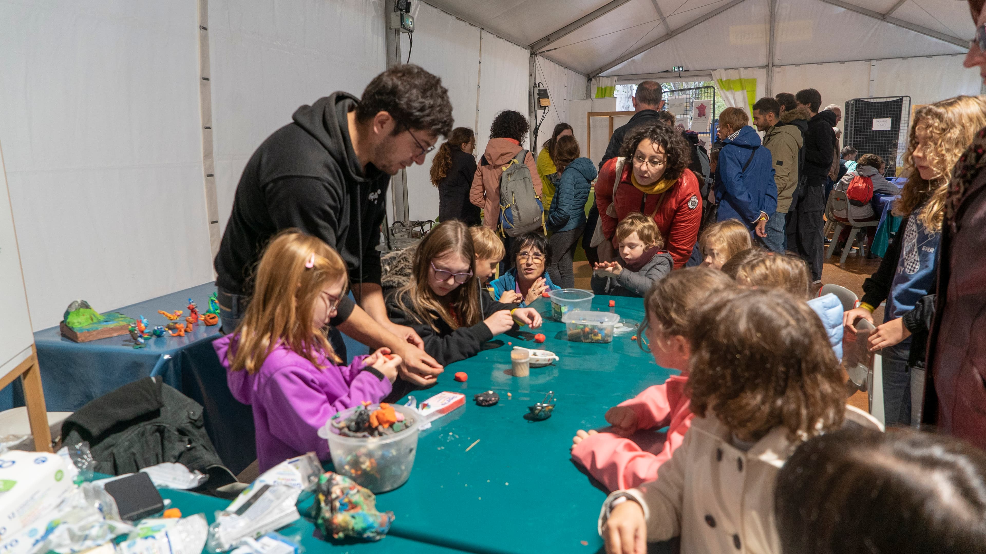Participants in the modelling clay workshop, Quai des savoirs